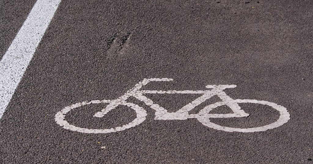 Bicycle painted on a tarmac road